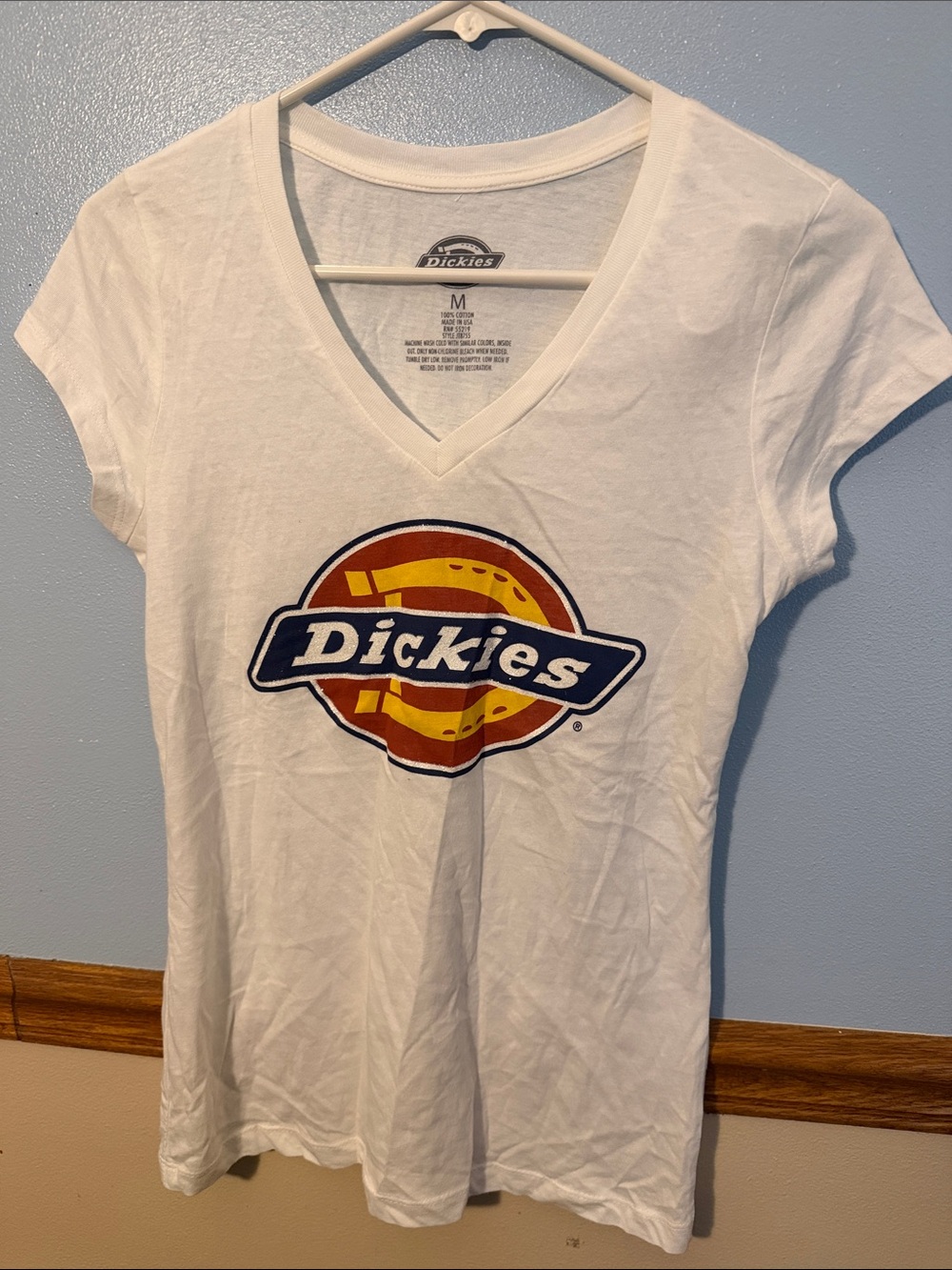 Dickies White V‑Neck Tee with Orange and Yellow Glittery Logo